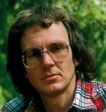 Ingemar Olsson, porträtt i skogen, 1970-talet.